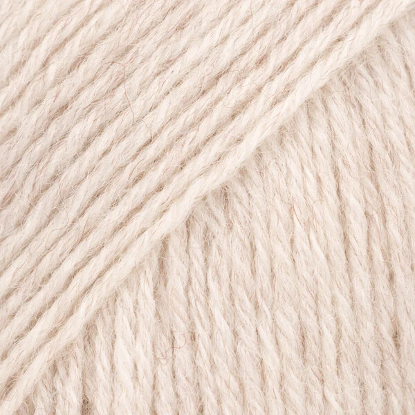 DROPS Fabel Uni Colour 124 Sabbia bianca