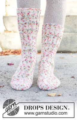 261-67 Twinkle Twist Socks by DROPS Design